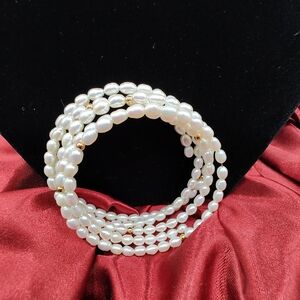 Freshwater Seed Pearls On A Memory Wire With Gold Tone Beads.